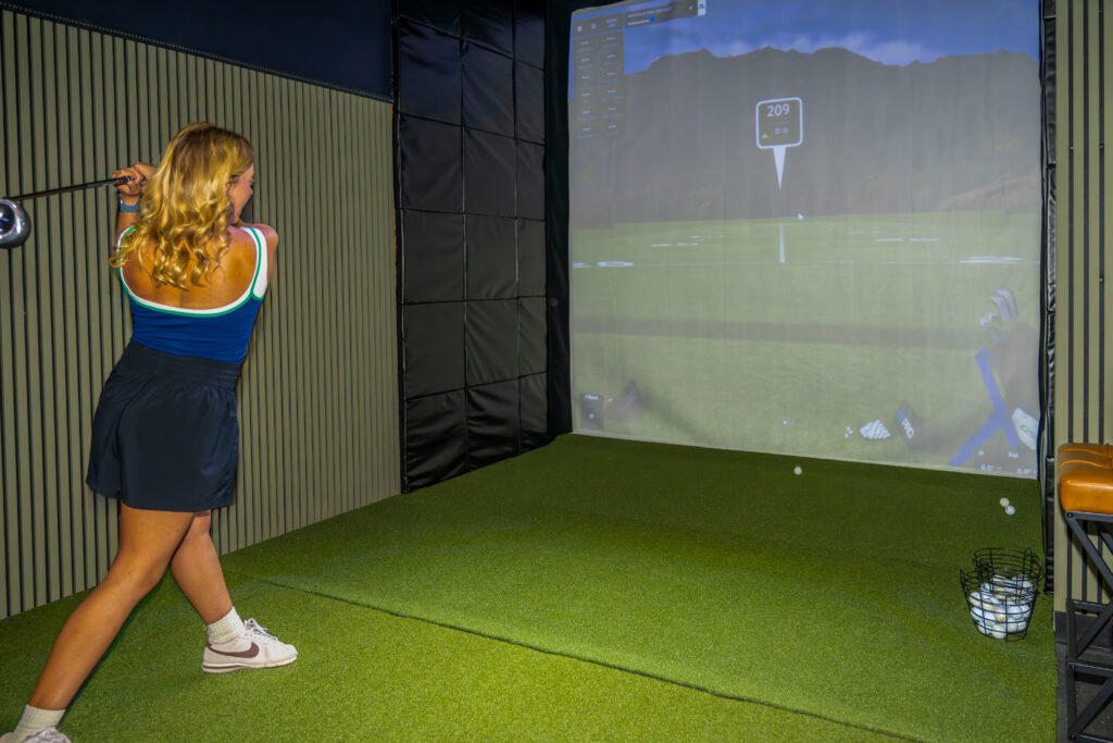 Golf simulator and games area at The Pine Reserve, Broken Bow