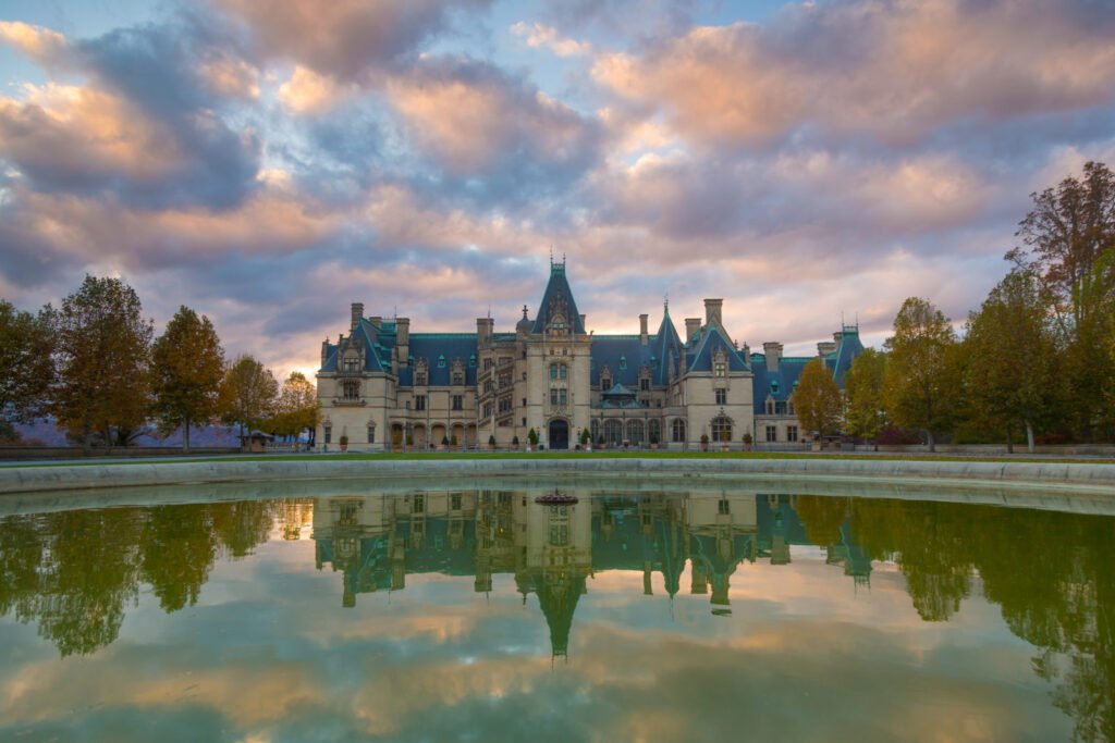 Biltmore Estate in Asheville, North Carolina reflected in the fountain at sunset