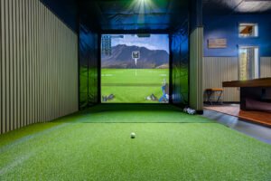 golf simulator indoor game room large group cabin Broken Bow Pine Reserve
